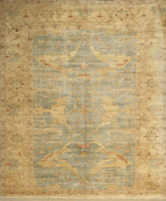 Appraisal: Pakistan Oushak Rug Modern Shaded blue ground with rosette and