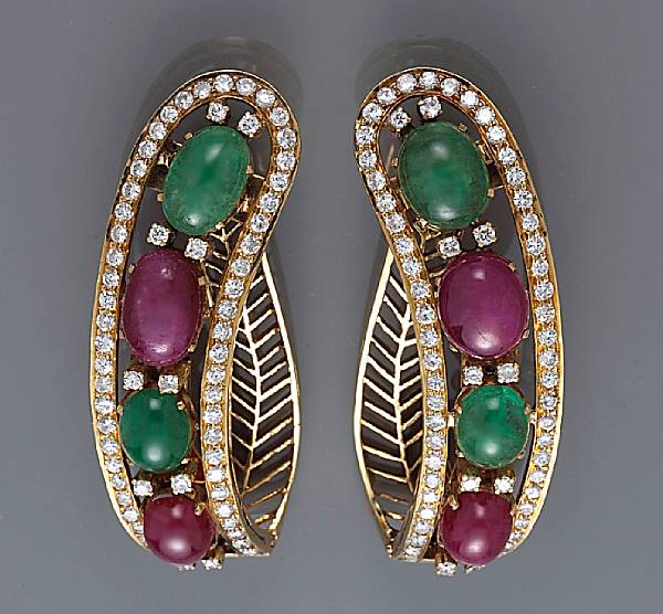 Appraisal: A pair of ruby emerald and diamond clip-screw-back earrings each