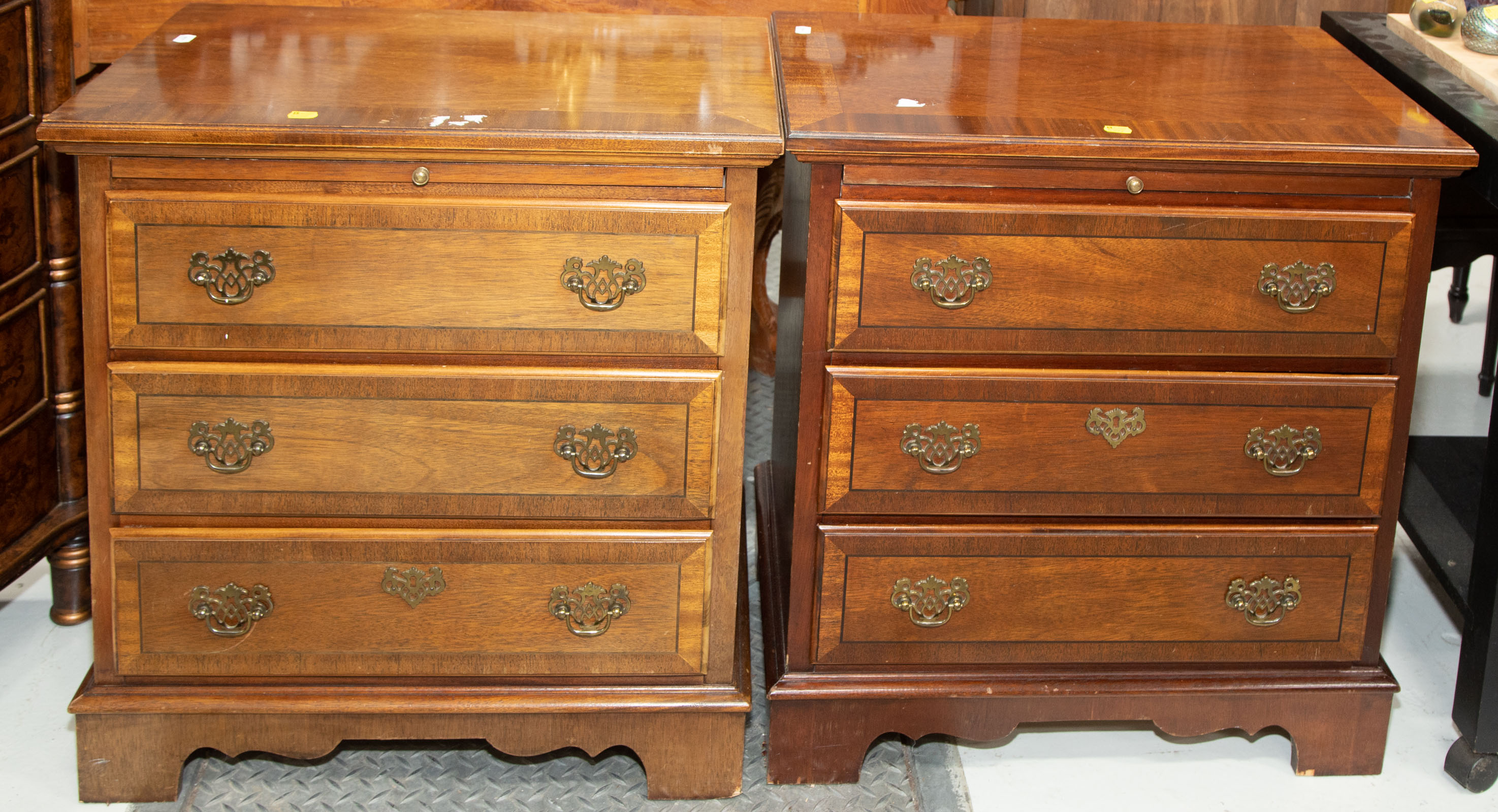 Appraisal: A PAIR OF MAHOGANY BACHELOR'S CHESTS Stoneleigh Furniture Co late