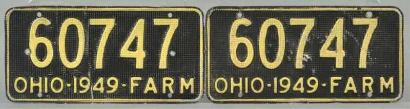 Appraisal: Matching Pair of Ohio Farm License Plates This lot consists