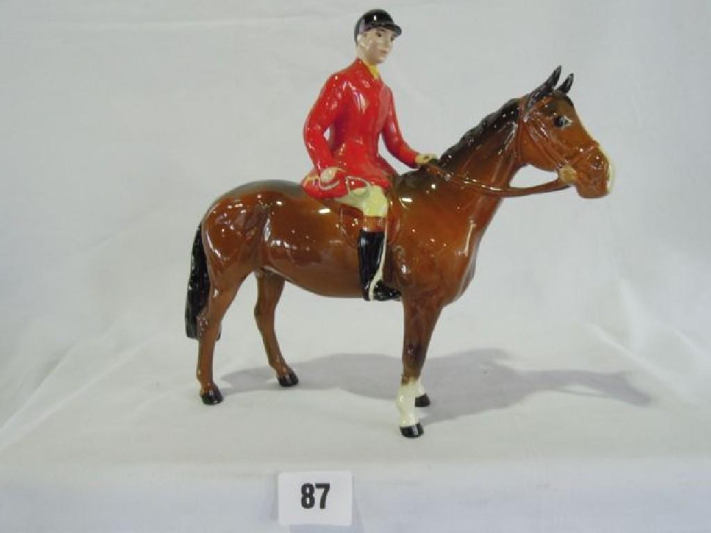 Appraisal: A Beswick model of a huntsman and horse