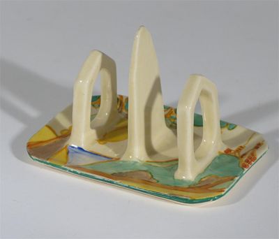 Appraisal: Secrets' a Clarice Cliff Fantasque Bizarre two slice toast rack