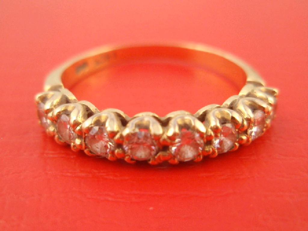 Appraisal: A half hoop diamond set eternity ring set with eight