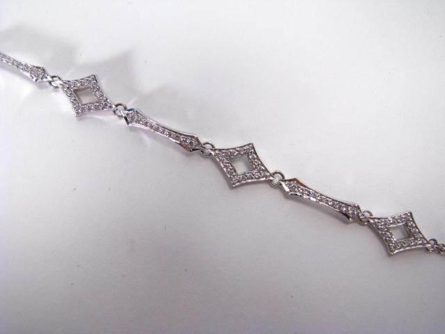 Appraisal: k white gold diamond bracelet with open diamond and bar