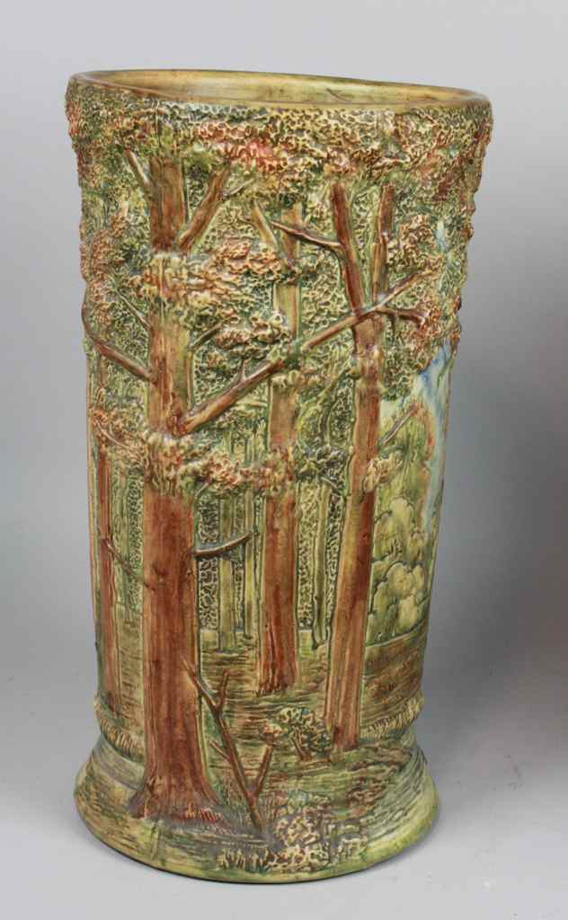 Appraisal: WELLER POTTERY FOREST PATTERN UMBRELLA STAND typically decorated with a