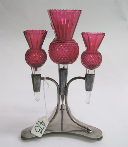 Appraisal: CRANBERRY GLASS AND SILVER PLATED EPERGNE four fitted cranberry to