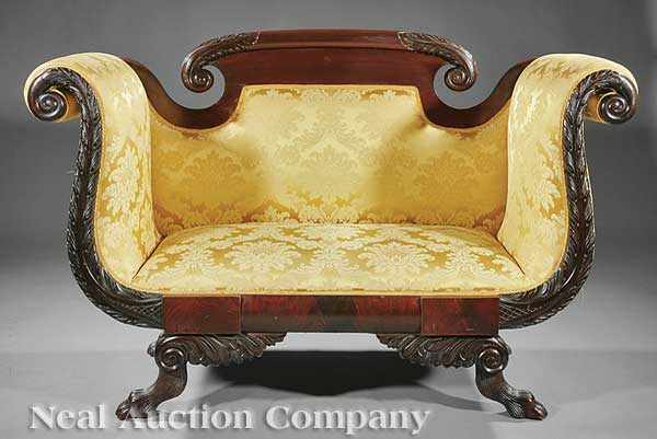 Appraisal: An American Classical-Style Carved Mahogany Settee th c arched crest