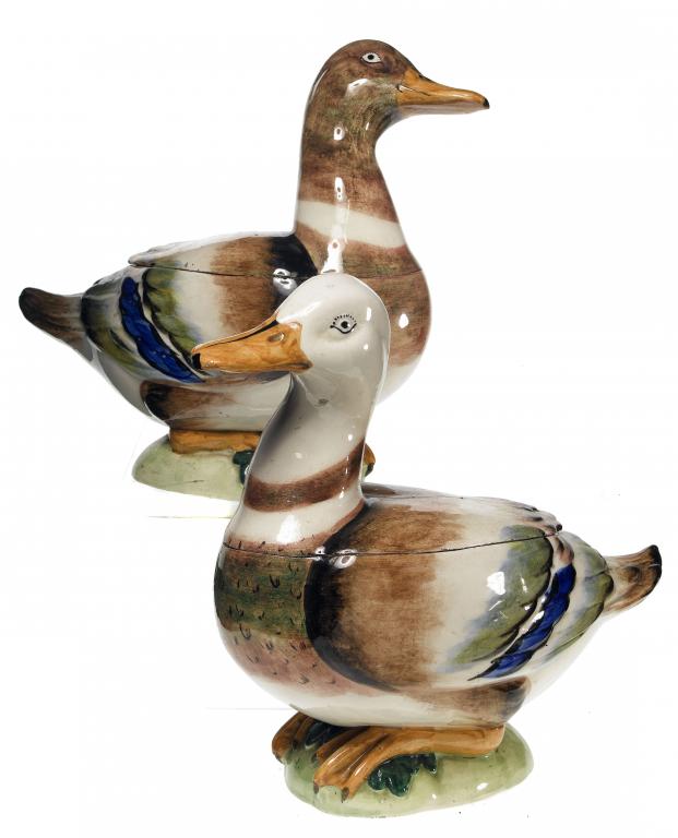 Appraisal: A PAIR OF PEARLWARE DUCK TUREENS AND COVERS the head