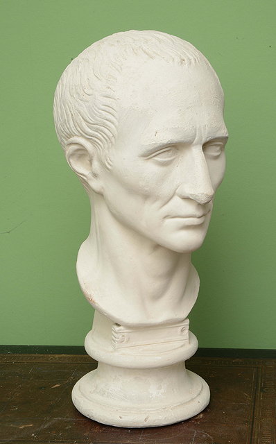 Appraisal: AN OLD PAINTED PLASTER BUST of Caesar high