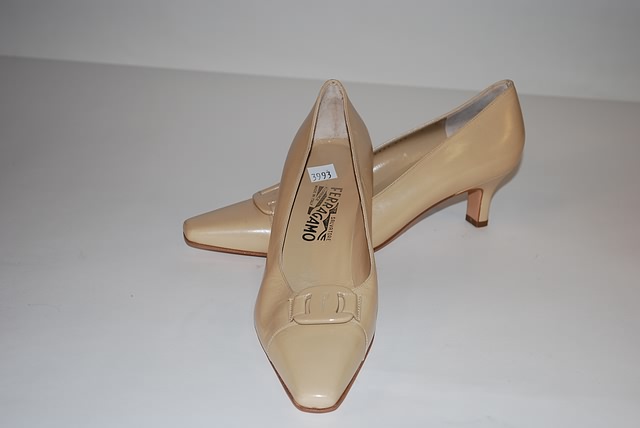 Appraisal: Salvatore Ferragamo beige calf pumps with front buckle Size B