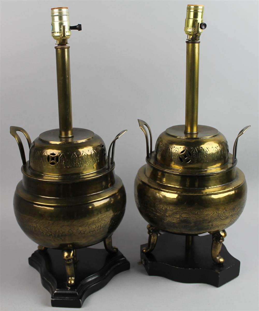 Appraisal: TWO SIMILAR BRASS ASIAN TABLE LAMPS mounted on differing but