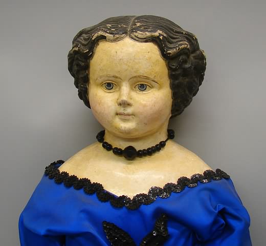 Appraisal: Unmarked Superior type papier mache shoulderhead doll Molded black hair