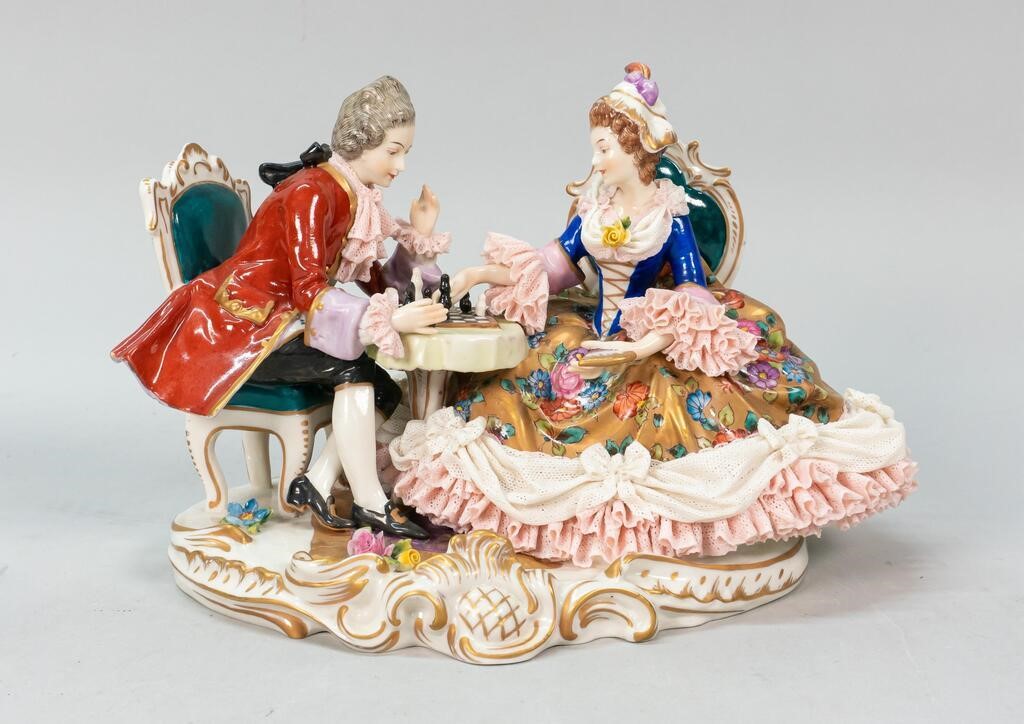 Appraisal: Aelteste Volkstedter German lace porcelain figure group couple playing chess