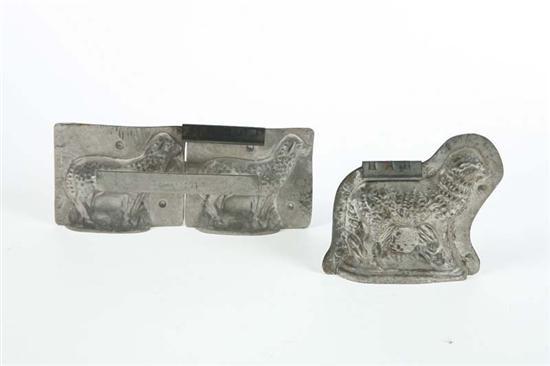 Appraisal: TWO CHOCOLATE MOLDS A tin two part standing sheep mold