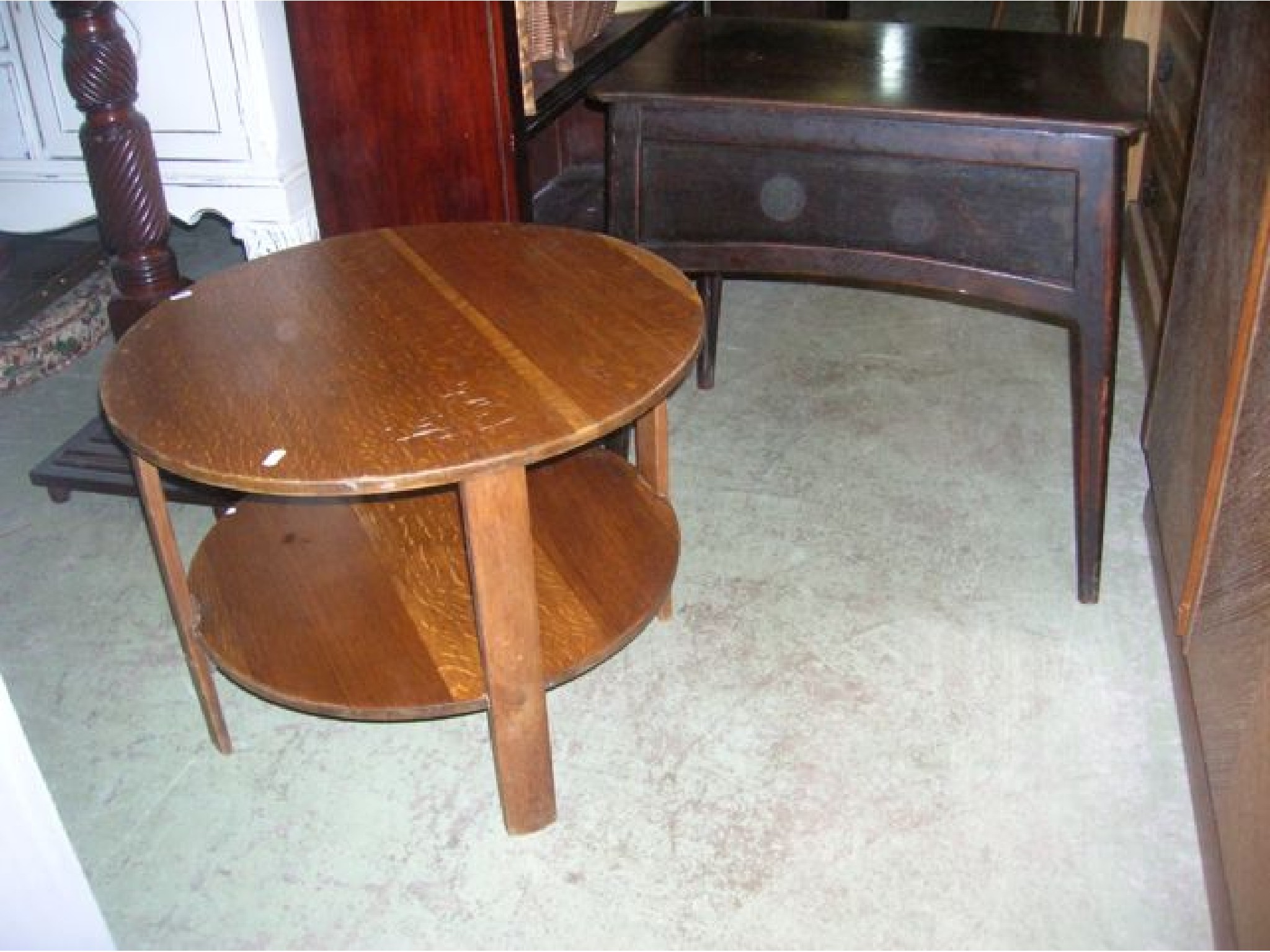 Appraisal: A stained oak Arts Crafts style occasional table of rectangular