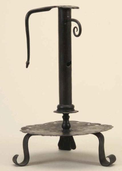 Appraisal: French Adjustable Iron Tin Candlestick Description th Century Side ejector