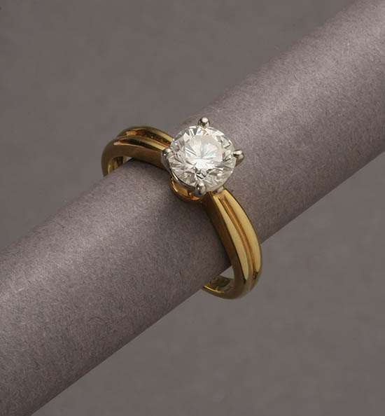 Appraisal: Lot Property of Various Owners Platinum and -Karat Yellow-Gold Solitaire