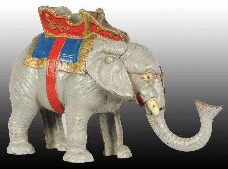 Appraisal: Cast Iron Elephant w Howdah Mechanical Bank Description Manufactured by