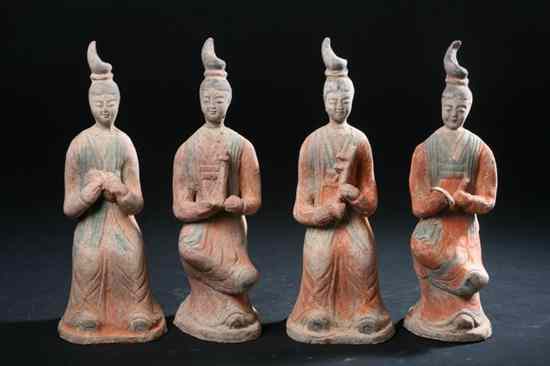 Appraisal: FOUR CHINESE POLYCHROME POTTERY FIGURES OF FEMALE MUSICIANS Tang Dynasty