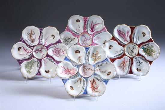 Appraisal: TWELVE FRENCH PORCELAIN OYSTER PLATES late th-early th century Polychrome