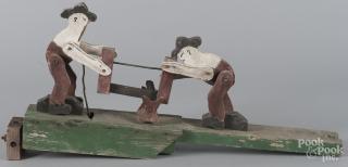 Appraisal: Painted pine whirligig early th c of two men sawing