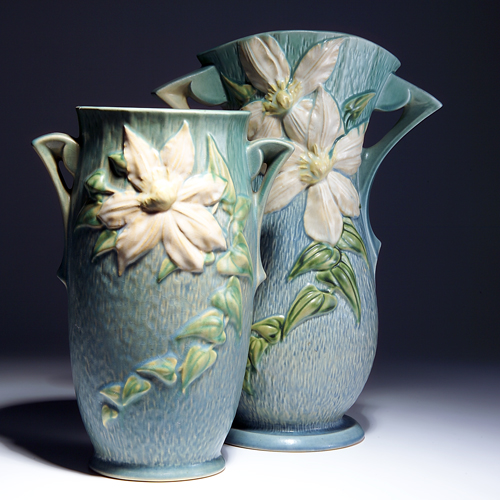 Appraisal: Two ROSEVILLE blue Clematis vases to include - as-is long