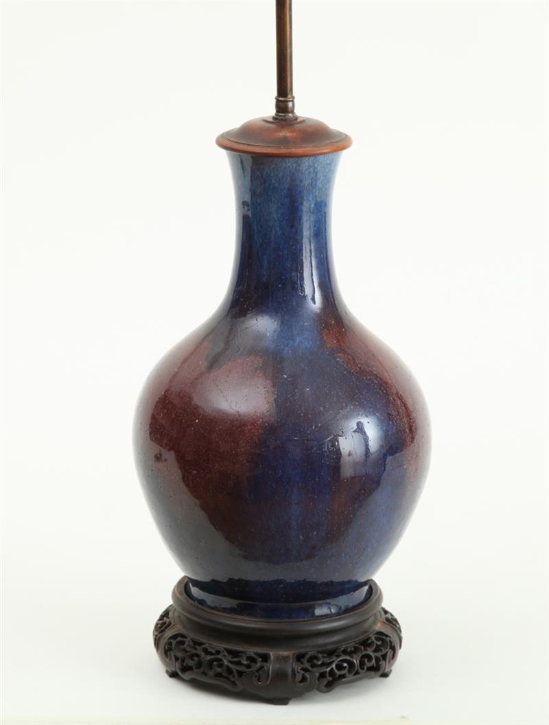 Appraisal: CHINESE FLAMB -GLAZED PORCELAIN BOTTLE VASE MOUNTED AS A LAMP