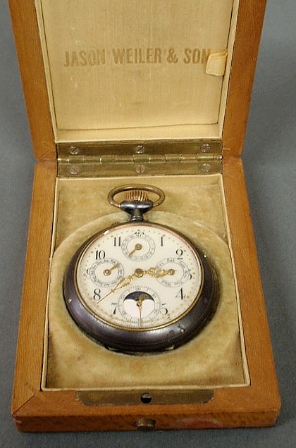 Appraisal: Swiss open face pocket watch with a moon dial face