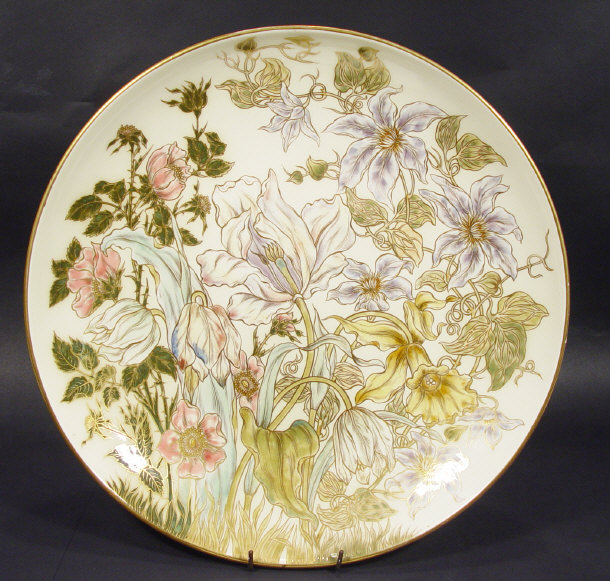 Appraisal: Zsolnay Pecs pottery charger hand painted and gilded with flowers