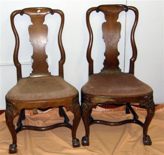 Appraisal: A PAIR OF GEORGE II WALNUT SIDE CHAIRS on carved