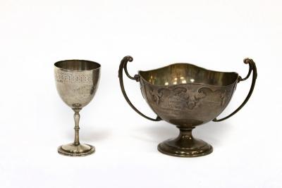 Appraisal: A silver trophy cup HF Co Birmingham with twin handles