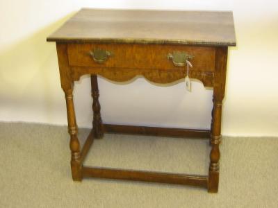 Appraisal: AN OAK SIDE TABLE late th century and later the