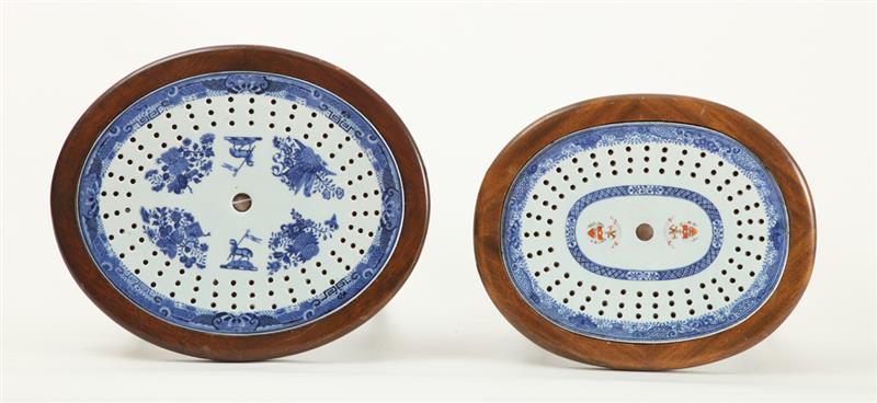 Appraisal: TWO CHINESE EXPORT ARMORIAL PORCELAIN MEAT DISH STRAINERS IN THE