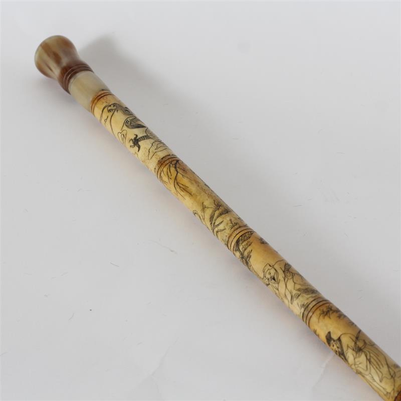 Appraisal: Chinese carved bone walking cane with dragon motif and horn