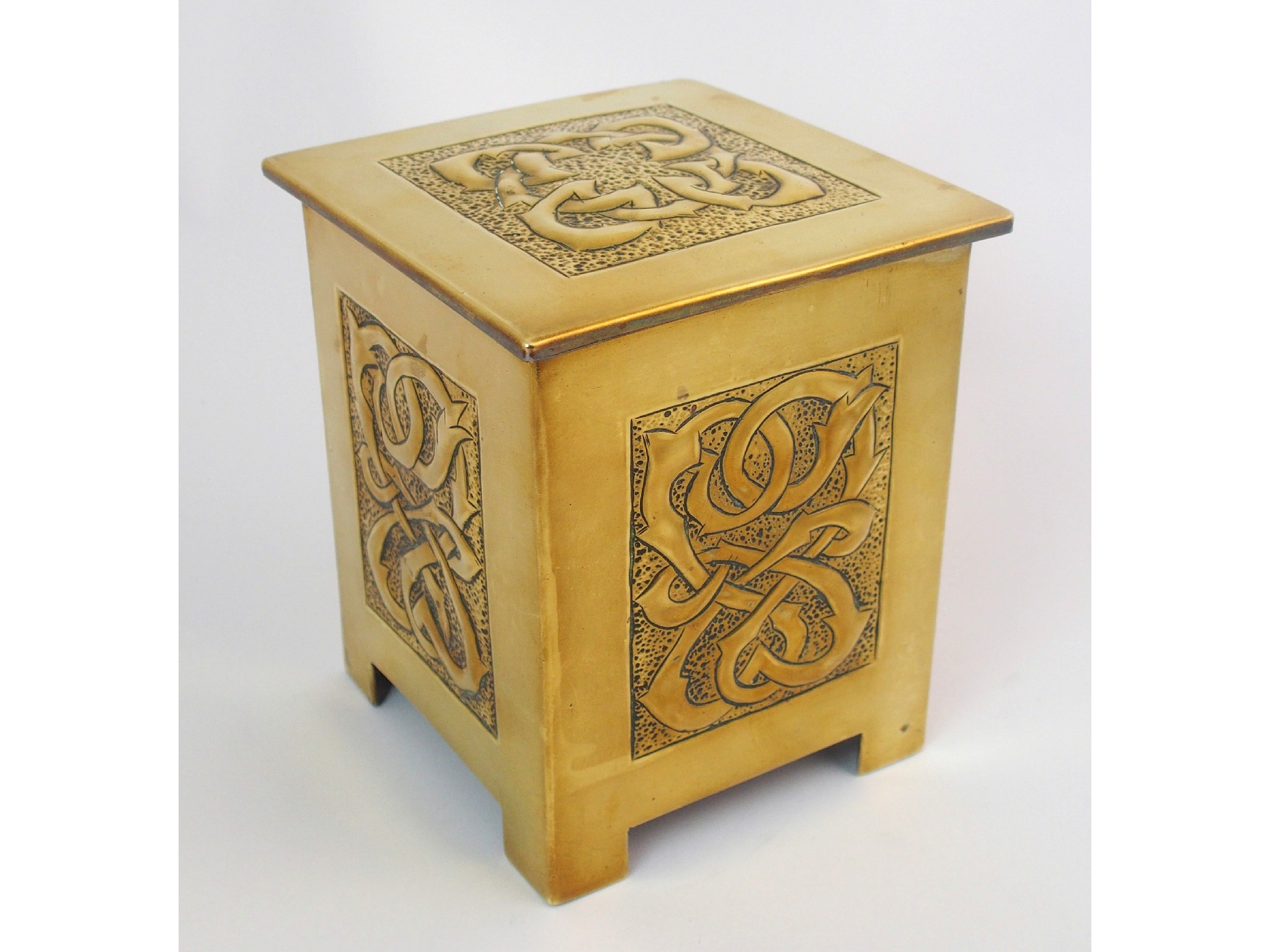 Appraisal: A Celtic revival brass tea caddy in the style of