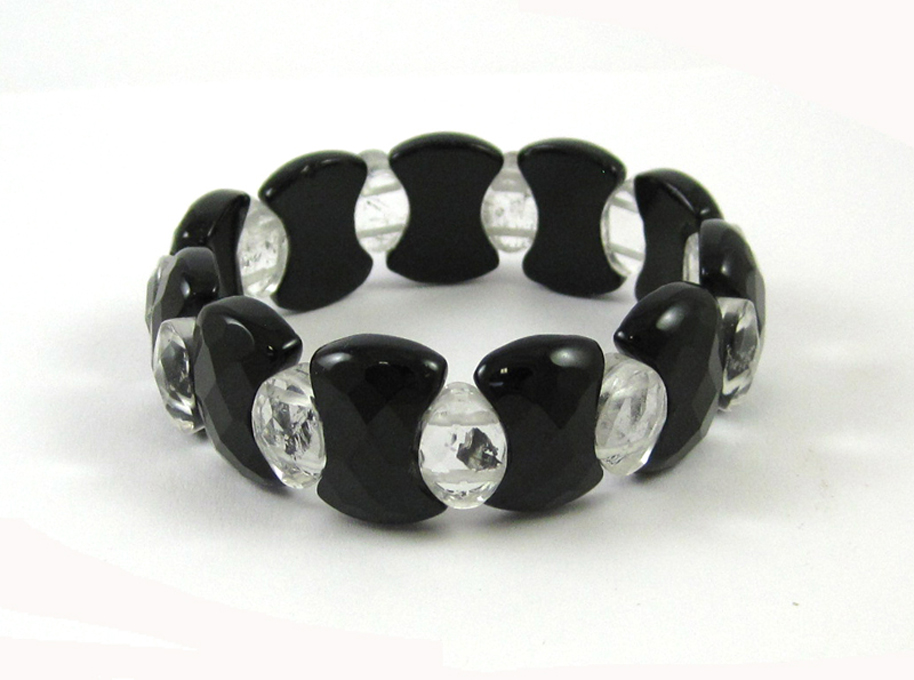 Appraisal: BLACK AGATE AND ROCK CRYSTAL STRETCH BRACELET with eleven faceted