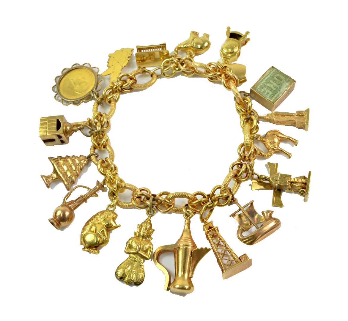 Appraisal: A gold charm bracelet with textured oval links detailed '