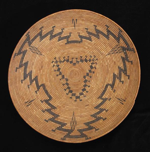 Appraisal: A Pomo tray Very finely woven with concentric stepped or