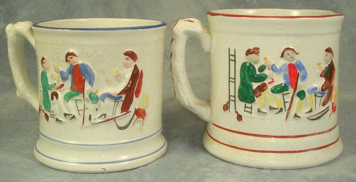 Appraisal: Staffordshire frog mugs molded tavern scenes on both sides h