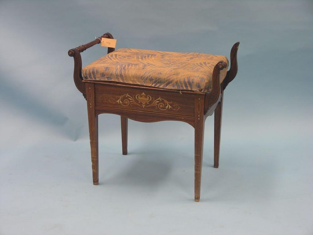 Appraisal: An Edwardian inlaid rosewood piano stool with hinged upholstered seat