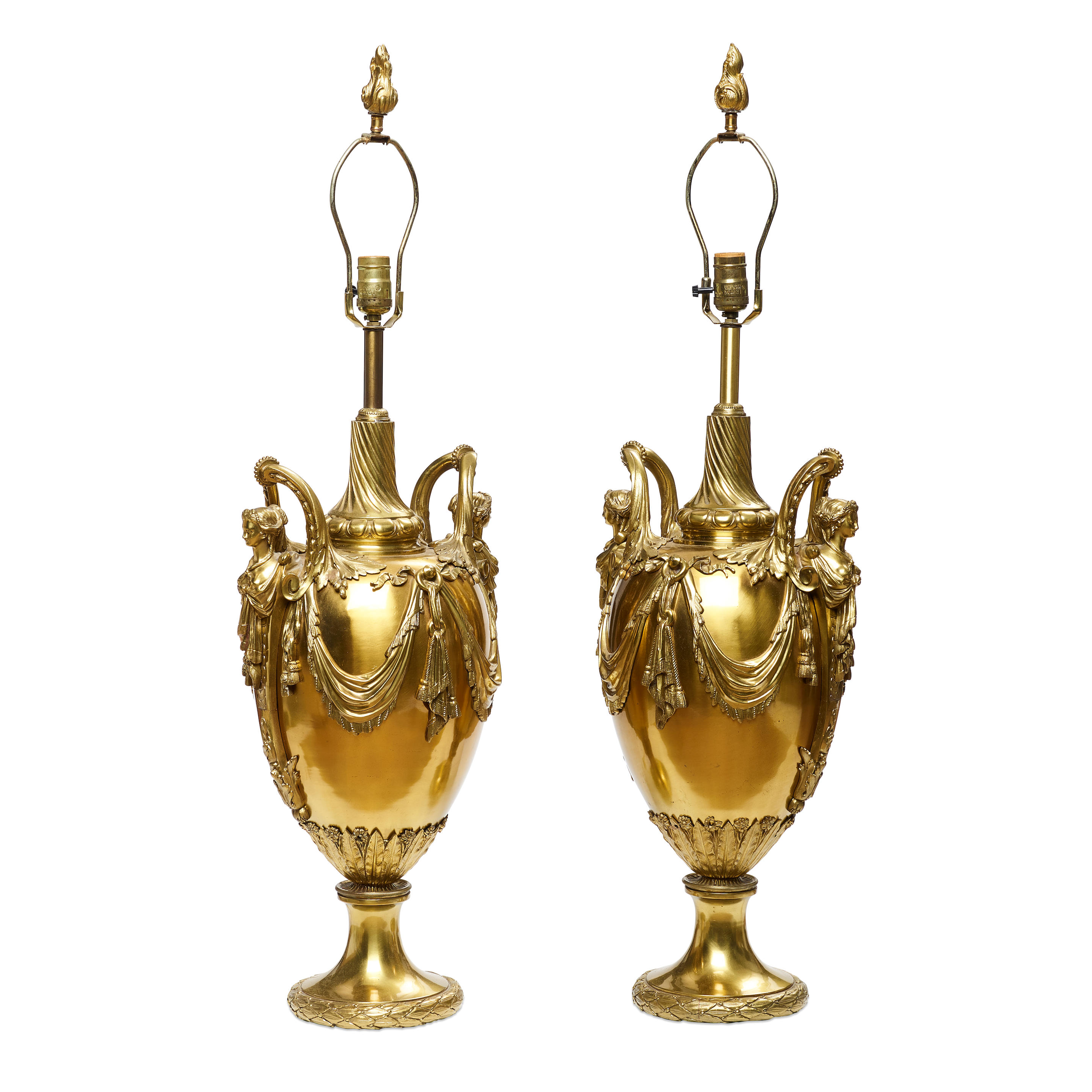 Appraisal: A PAIR OF LOUIS XVI STYLE GILT METAL TWO-HANDLED URNS