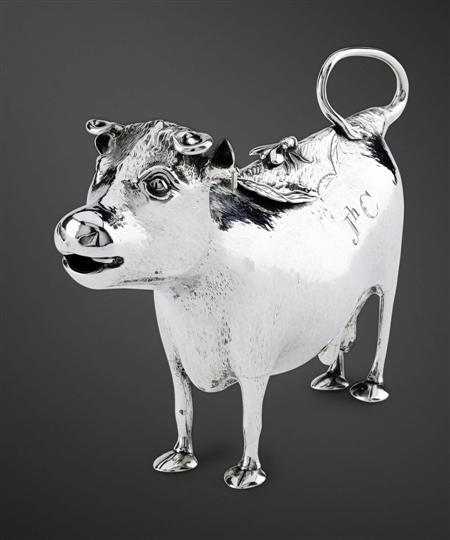 Appraisal: A George III silver cow creamer John Schuppe London -