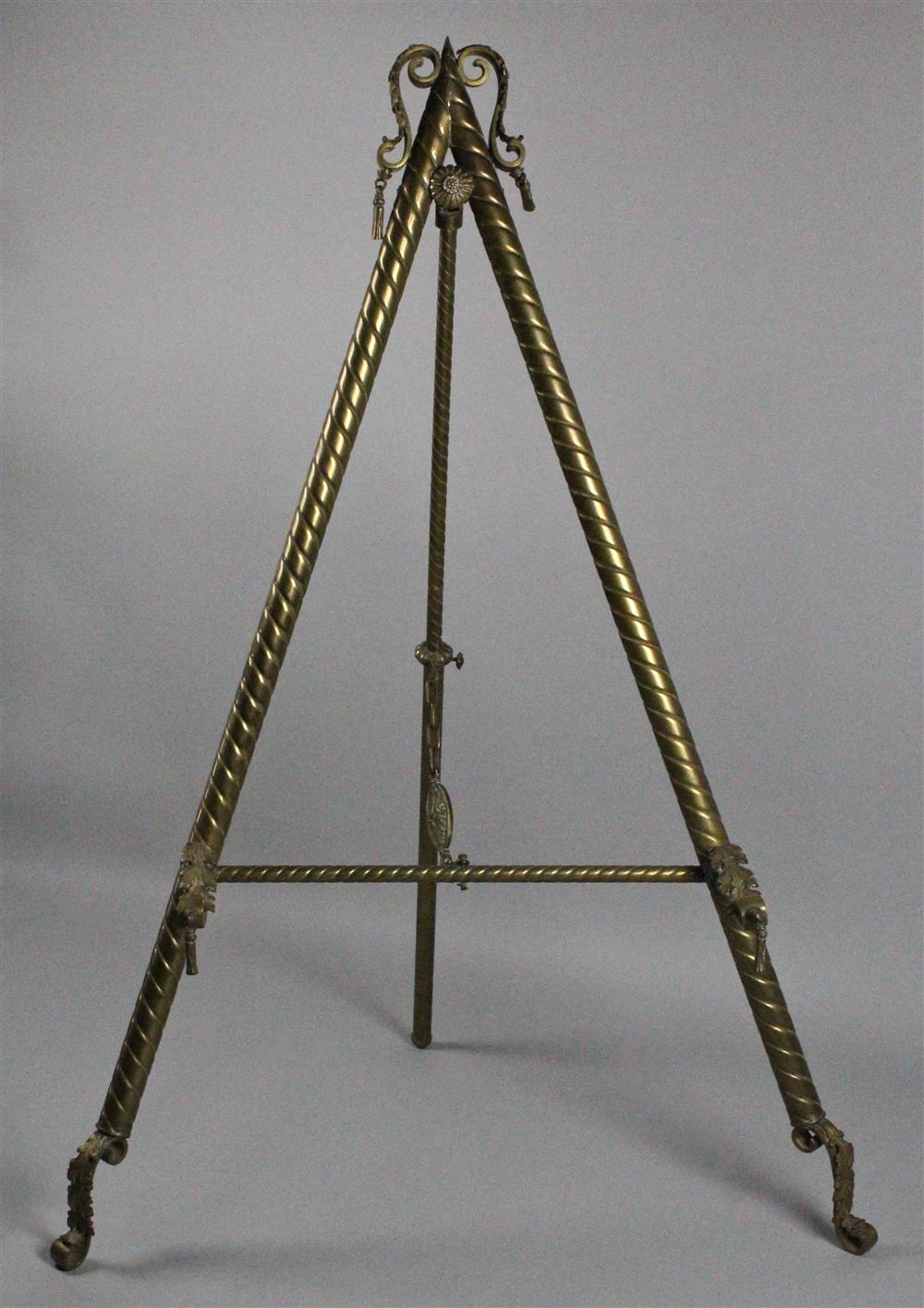 Appraisal: STANDING BRASS EASEL early th Century with barley twist stiles