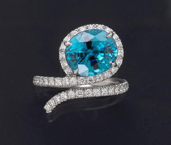 Appraisal: A blue zircon and diamond ring zircon weighing carats mounted