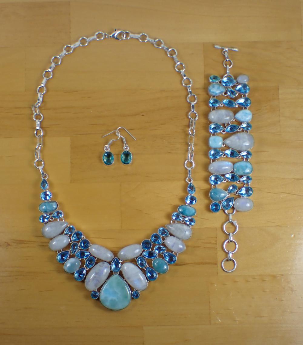 Appraisal: BLUE TOPAZ RAINBOW MOONSTONE AND LARIMAR JEWELRY SET pieces including