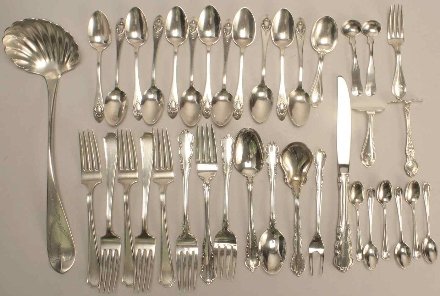 Appraisal: THIRTY-EIGHT PIECES OF AMERICAN SILVER FLATWAREBy various makers Includes coin