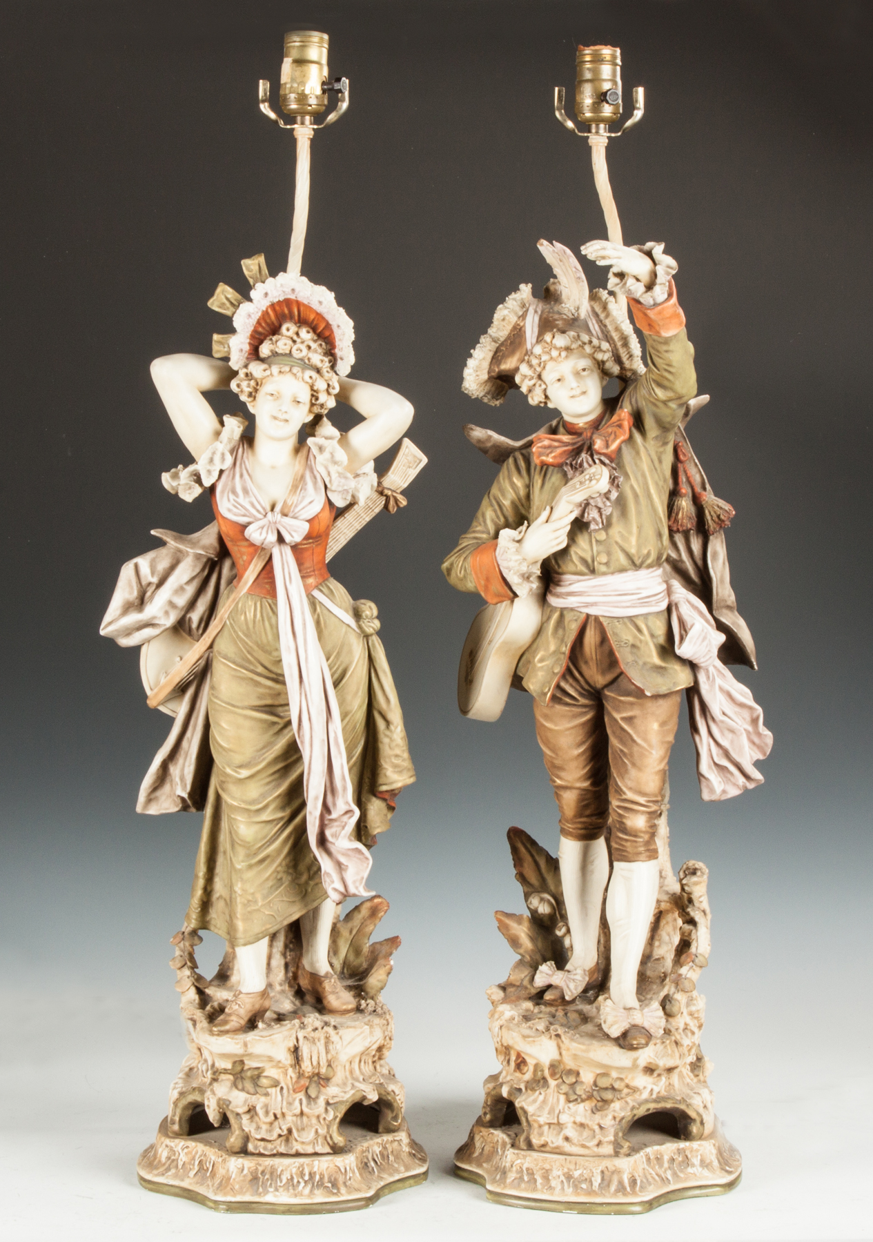 Appraisal: Bisque Lamp Bases of Courting Couple with Musical Instruments