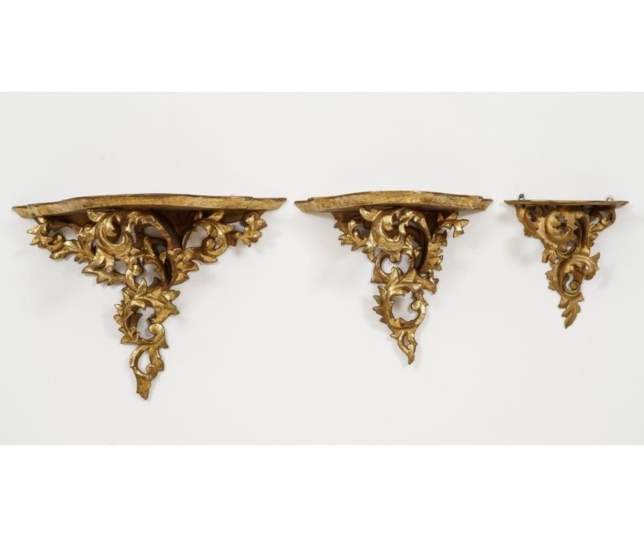 Appraisal: Three Italian gilt and wood carved wall brackets Largest h