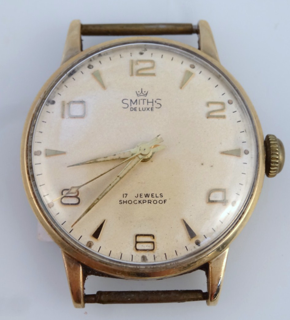 Appraisal: A mid- thC Smiths deluxe watch head the circular cm