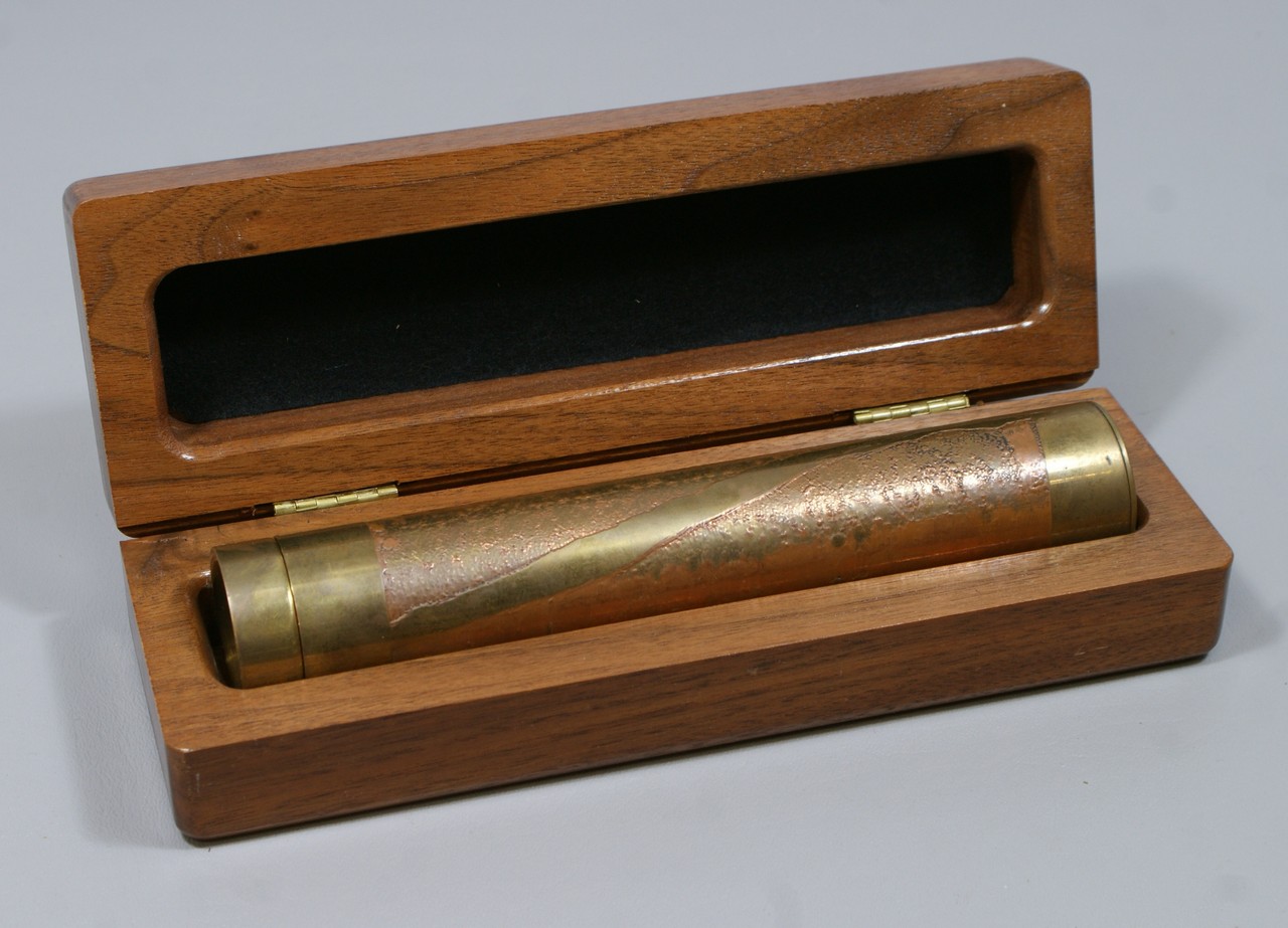 Appraisal: Stephen Auger etched brass and copper kaleidoscope tube fitted walnut